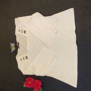 Karl L. white long-sleeved blouse with metallic details on the top of each side.